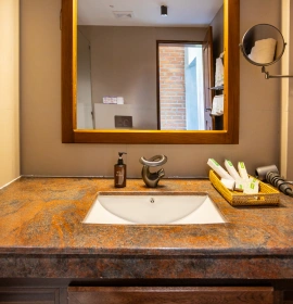  three shampoo bottles in the bathroom